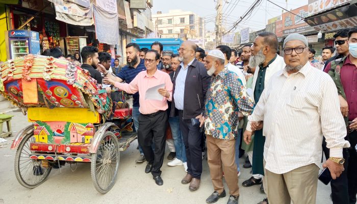 ঢাকা-১১ আসনে গণসংযোগে ব্যস্ত ড. এম এ কাইয়ুম