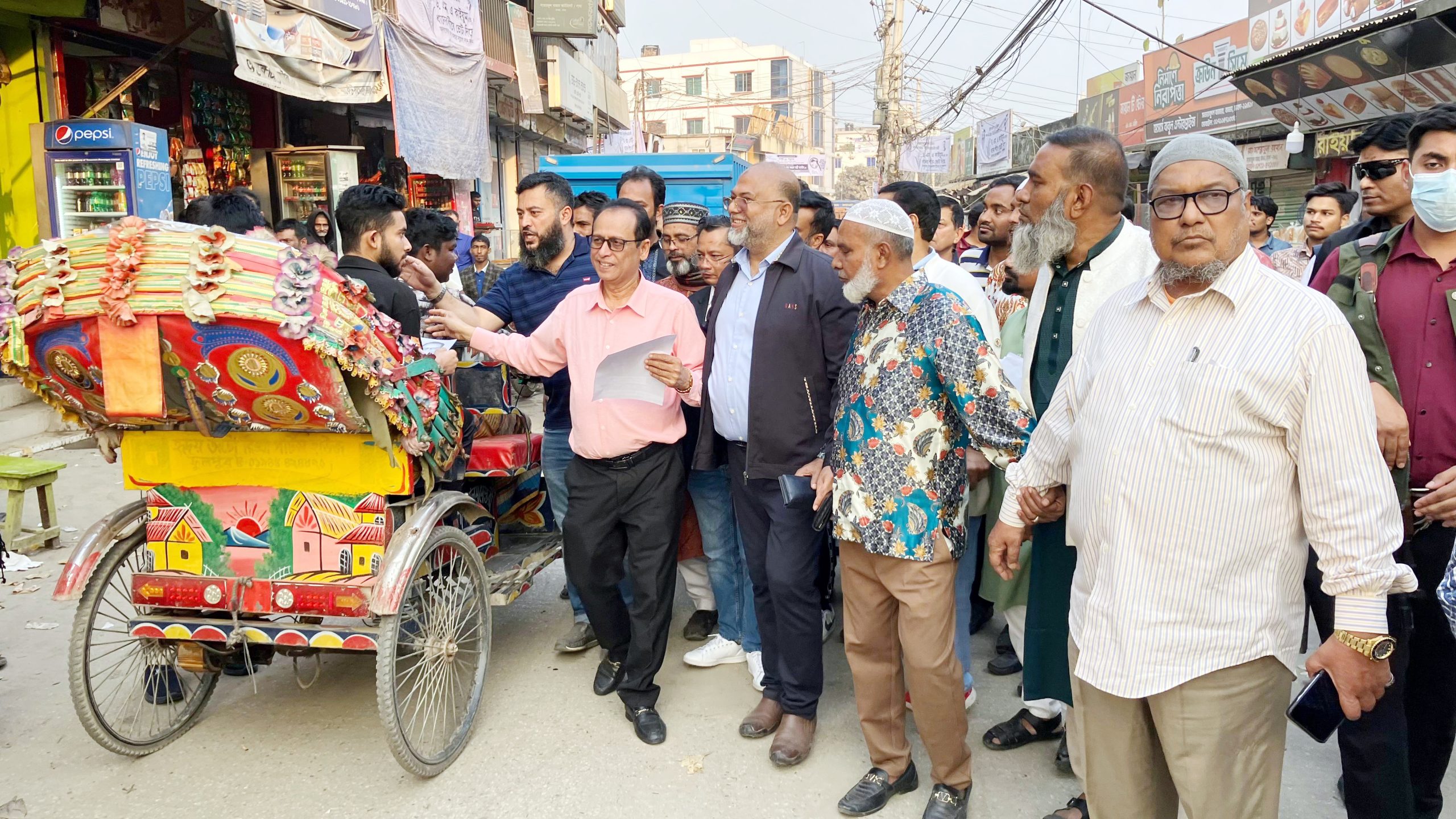 ঢাকা-১১ আসনে গণসংযোগে ব্যস্ত ড. এম এ কাইয়ুম